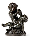A FRENCH BRONZE BACCHIC GROUP, IN THE MANNER OF CLAUDE MICHEL, KNOWN AS CLODION (1738-1814)