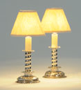 A PAIR OF VICTORIAN SILVER DWARF CANDLESTICKS, IN CHARLES II STYLE, FITTED FOR ELECTRIC LIGHT